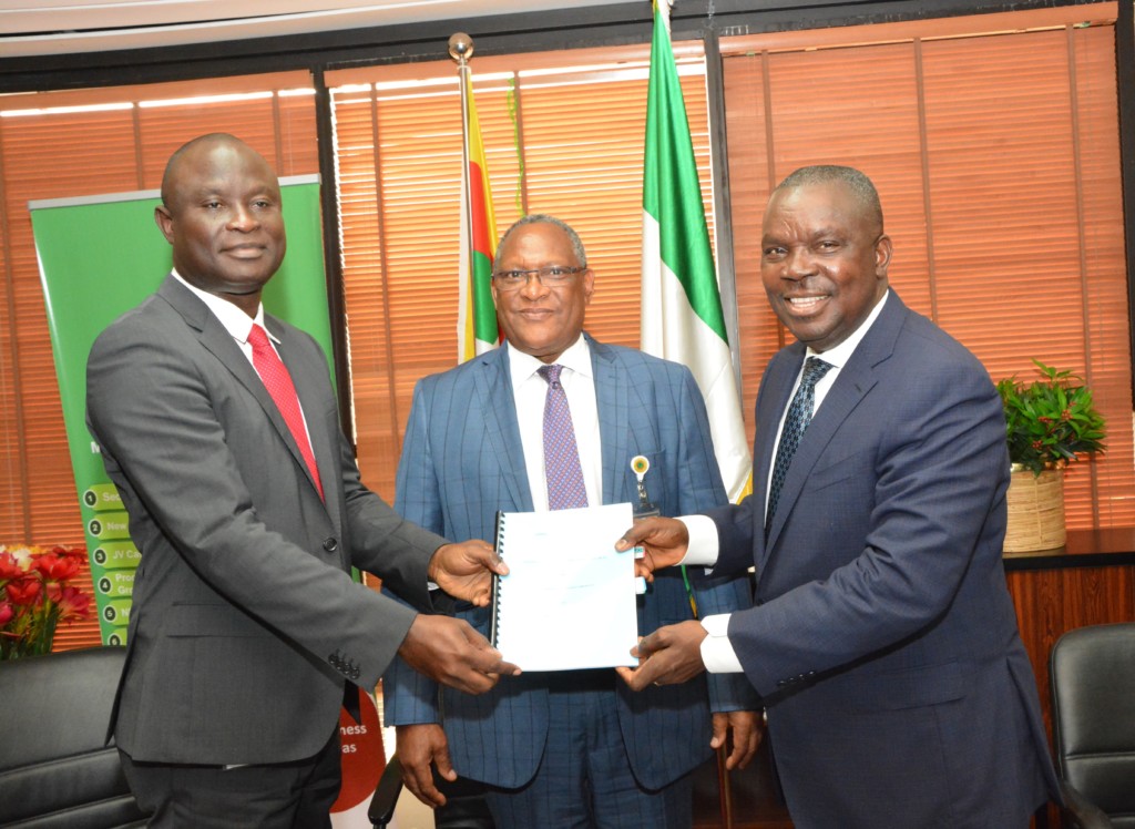 THE MD, NGPTC, MR. BABATUNDE BARKARE (left) EXCHANGE THE SIGNED AGREEMENT WITH THE MD, SEPLAT, MR. AUSTIN AVURU. WHILE THE COO, GAS AND POWER, ENGR. SAIDU MOHAMMED WATCHED WITH INTEREST AFTER T