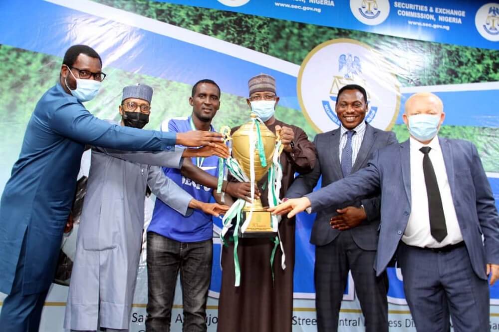 Yuguda Receives Trophy From Victorious SEC Football Team, Highlights  Importance Of Sports To Economic Development – The Whistler Nigeria