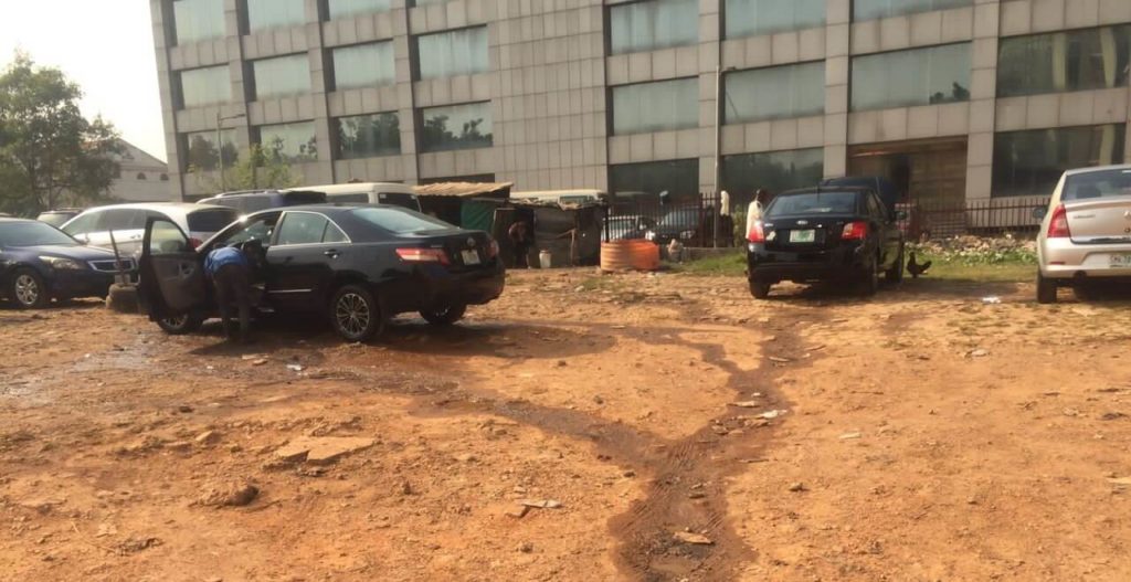 ATTACHMENT DETAILS Saved.  An-illega-car-wash-stand-near-Unity-bank-Central-Area-after-NNPC-towers.-1-scaled