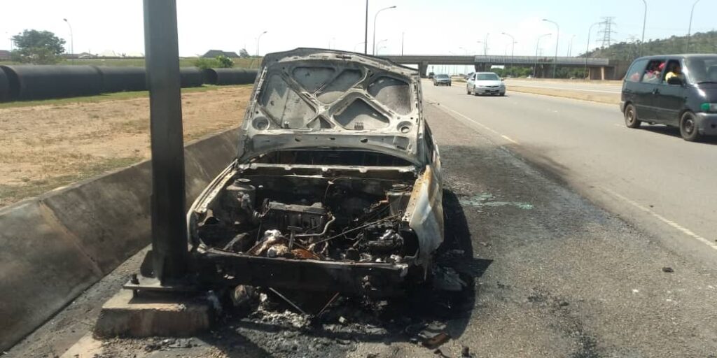 Fire-Guts-Abuja-Drivers-Car-While-Buying-Petrol-From-Roadside-Vendors-