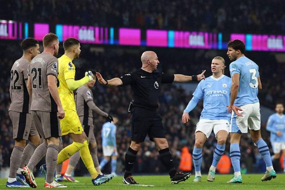 Tottenham and Manchester City Players With The Referee
