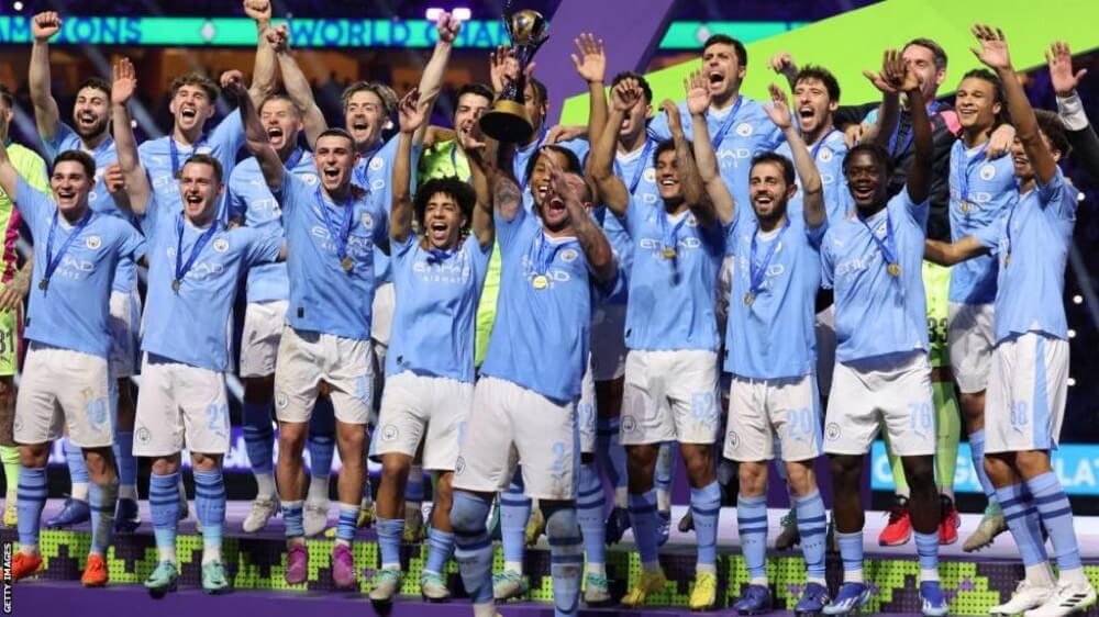 Manchester City Players Celebrate With The World Club Cup Trophy