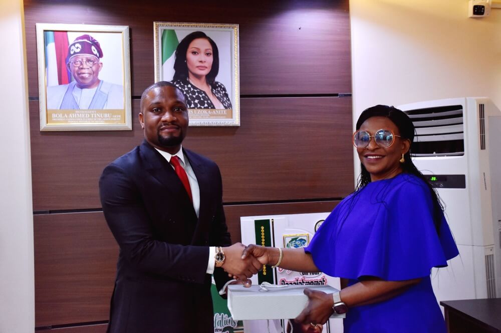 R-L, The Executive Director/CEO of Nigerian Export Promotion Council (NEPC) Nonye Ayeni presenting a souvenir to the Director General of Small and Medium Enterprises Development Agency of Nigeria (SMEDAN), Mr. Charles Odii, when the latter paid her a visit in Abuja yesterday.