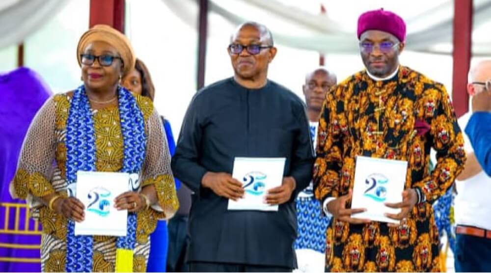 From L-R: Deputy Governor of Rivers State, Her Excellency, Ngozi Odu; the Presidential Candidate of Labour Party in 2023 General Election, His Excellency, Mr. Peter Obi and the Deputy Speaker of the House of Representatives, His Excellency, Rt. Hon. Benjamin Okezie Kalu displaying Silver Jubilee Anniversary Book of the Madonna University, Elele, Rivers State on Wednesday.