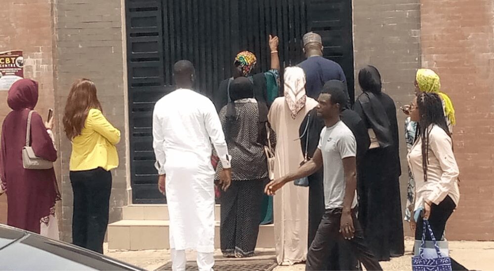 Parents at the premises of the Abuja school where a student was bullied