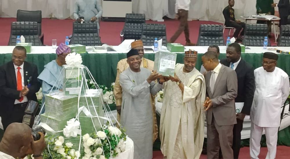 The Minister of Education, Dr. Tunji Alausa and the Executive Secretary of NUC, Prof. Abdulhahi Ribadu during the unveiling of a four-volume compendium, Key Achievements and Impacts of the Africa Centres of Excellence Project in Nigeria on Monday.