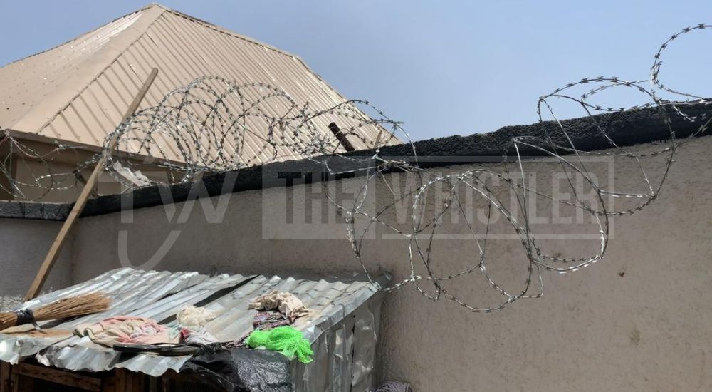 The Dislodged barbed wire through which soldiers allegedly gained access